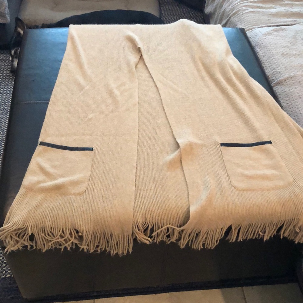 Poncho style scarf with pockets